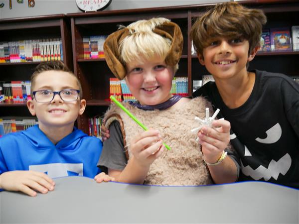 Students learning and having fun in Library.